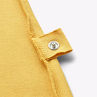 ABELLIN, organic t-shirt for disabled children - Curry Yellow (snap button at the waist)