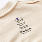 ABELLIN, organic t-shirt for disabled children - Sand Beige (printed labels)